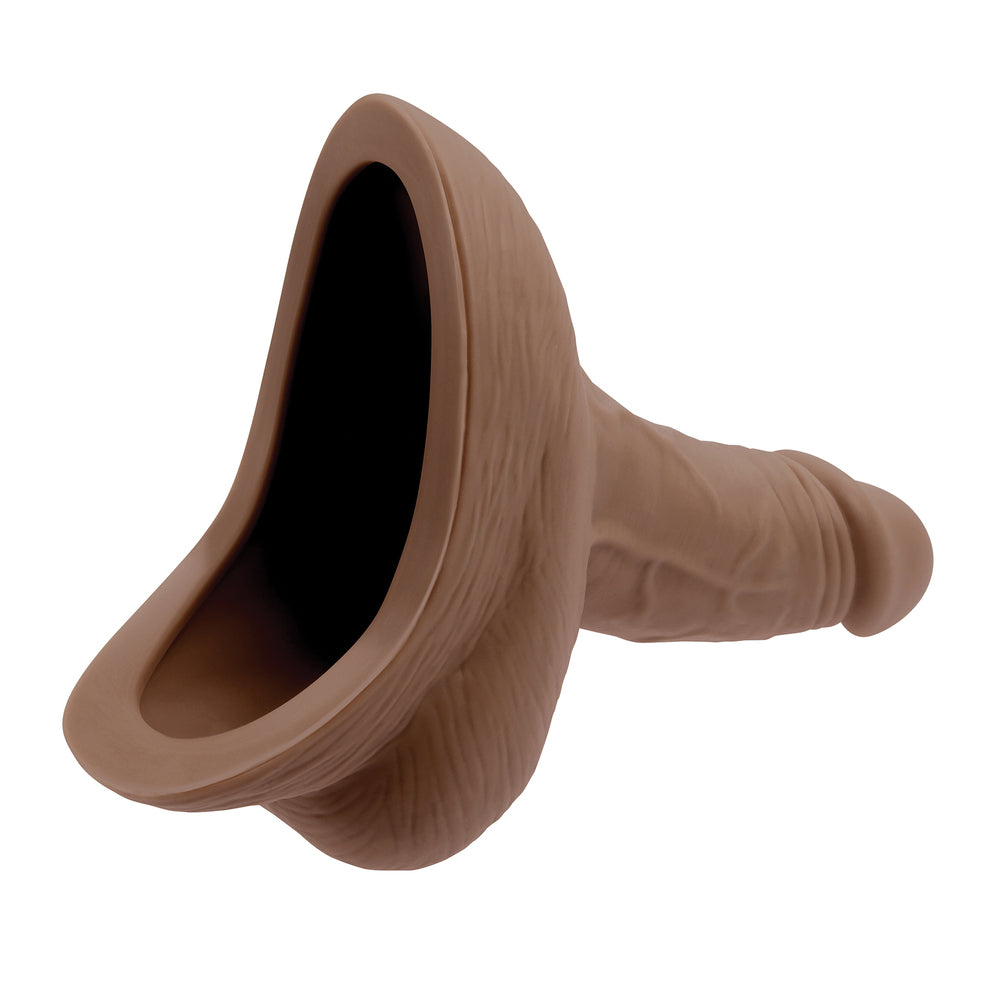 Brown plastic funnel on a white background
