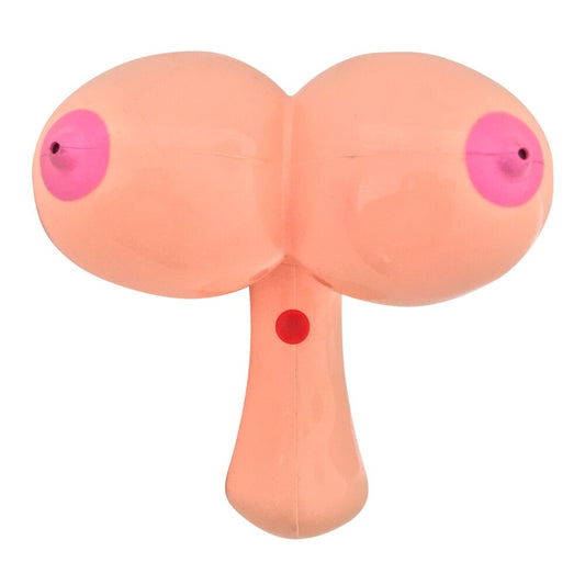 A flesh pink water pistol designed to look like breasts, with each nipple serving as a separate nozzle. The gun has a simplistic, cartoon-like appearance.