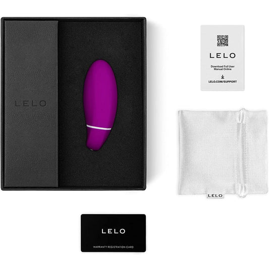 Purple LELO product in a black box with accessories on a white background