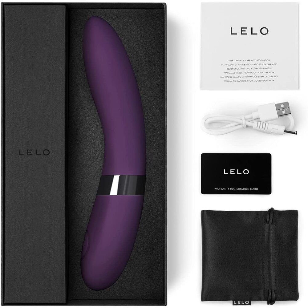 Purple electronic device in a black box with Lelo branding, including a cable and warranty card.