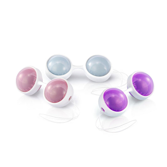 White device with purple and gray spherical components on a white background