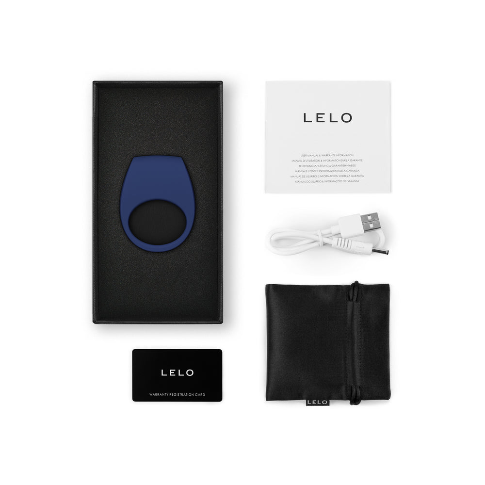 LELO product packaging with blue device, black case, USB cable, and warranty card on a white background