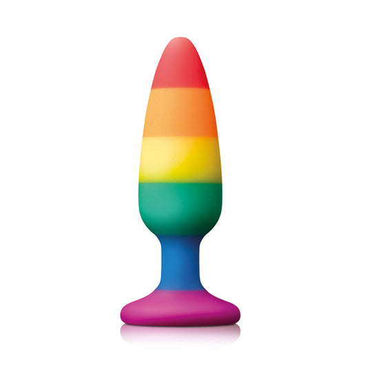 Rainbow-colored silicone butt plug on a white background