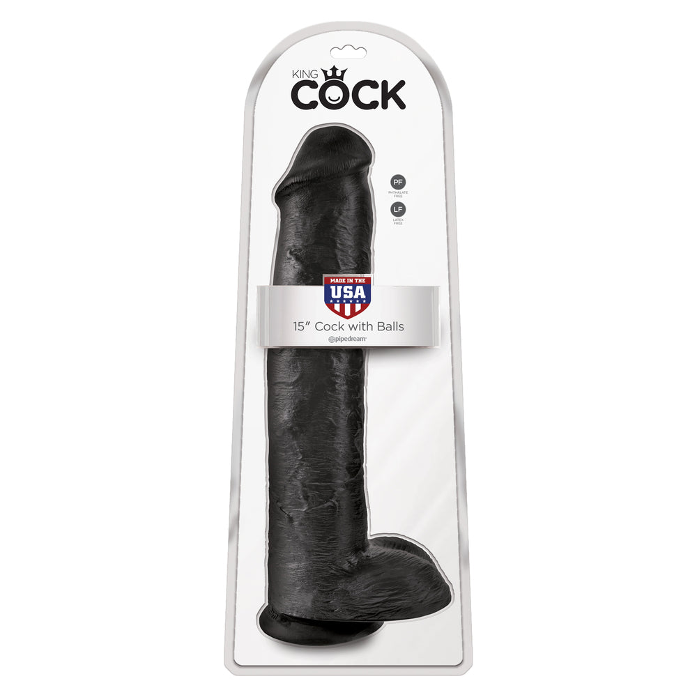 Black cock with balls toy in packaging on a white background
