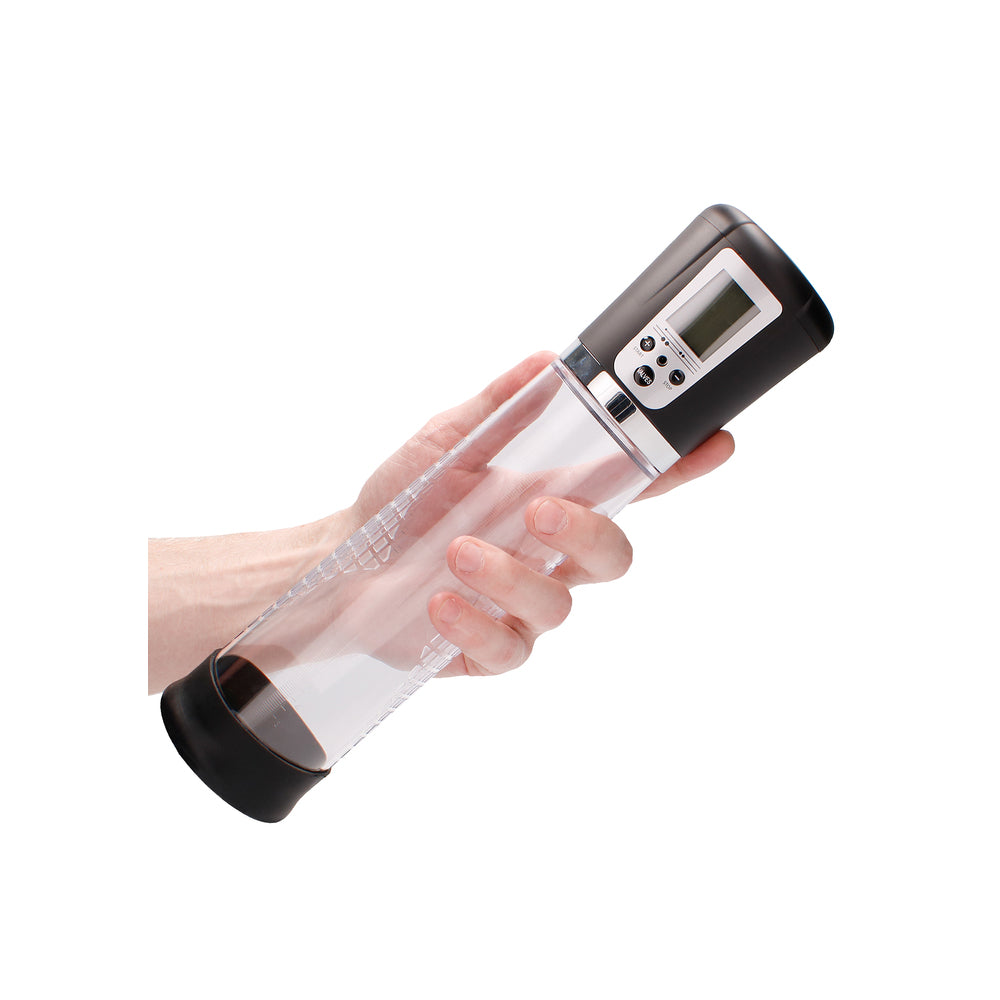 Hand holding a transparent electronic device with black accents on a white background