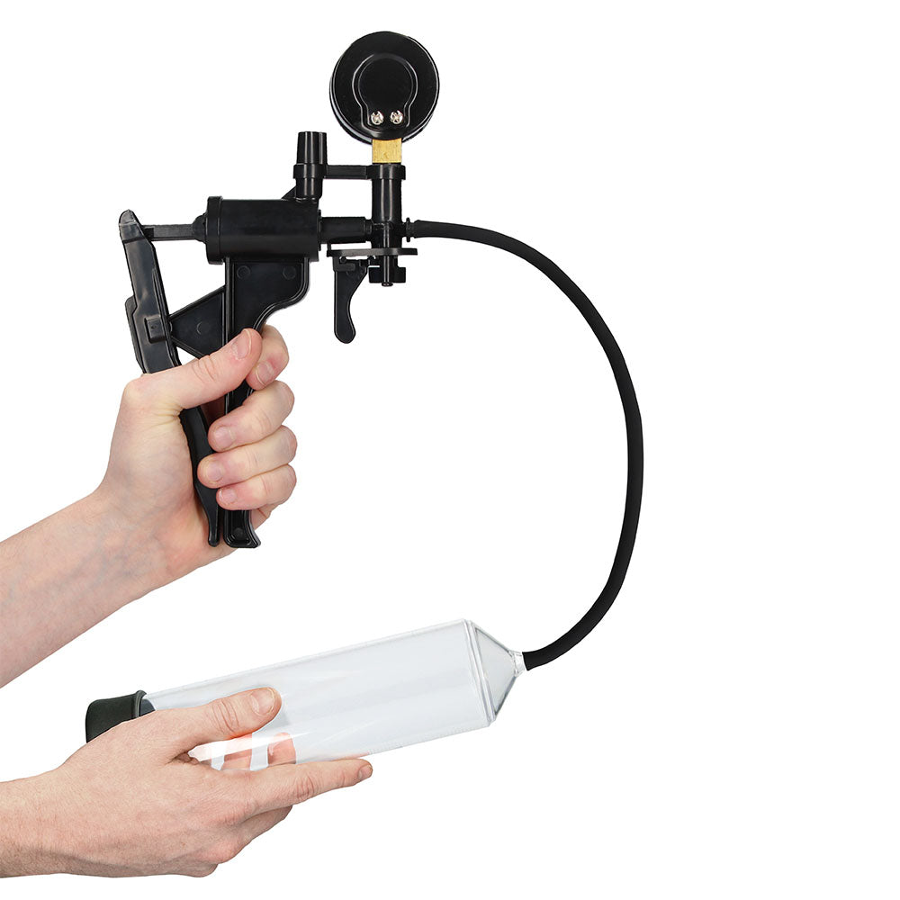 Hand holding a black and white tool with a hose on a white background