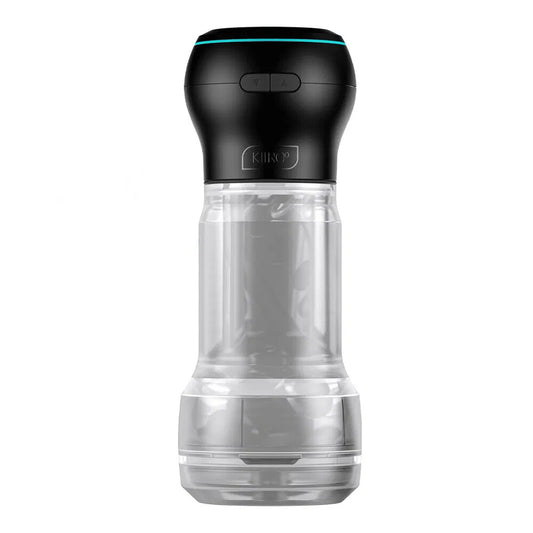 A clear, cylindrical masturbator with a black controller on top. The device has a sleek, compact design and is made of silicone.