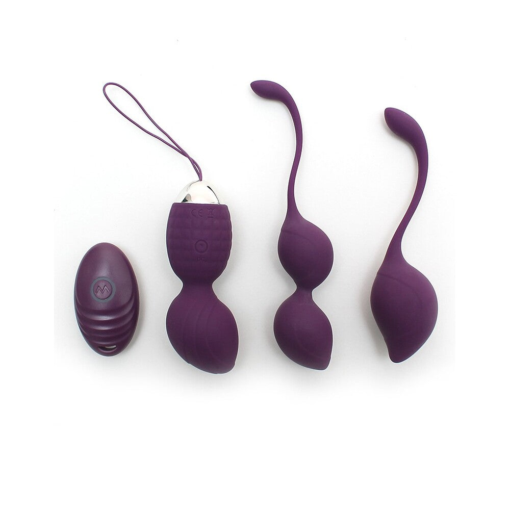 A set of three purple kegel balls with a rechargeable battery-operated remote control. The set includes two regular shaped balls and one heart-shaped ball.