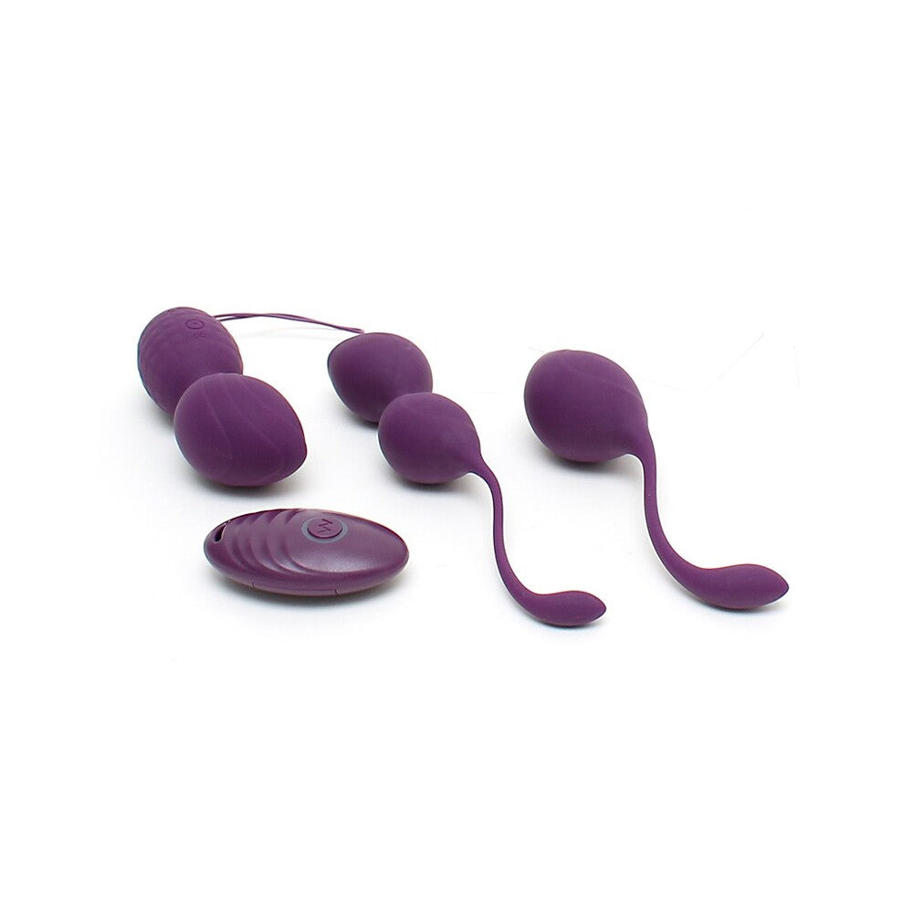 Purple silicone adult product on a white background