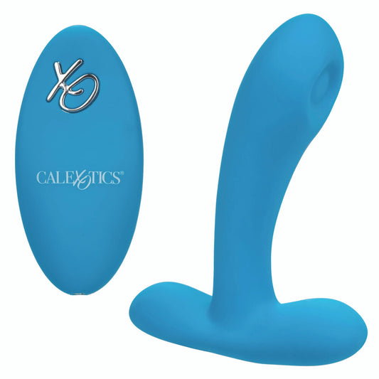 A blue silicone vibrator with a curved design and a small remote control featuring the brand name 'California Exotics'. The vibrator has a smooth surface and a powerful pulsating tip.