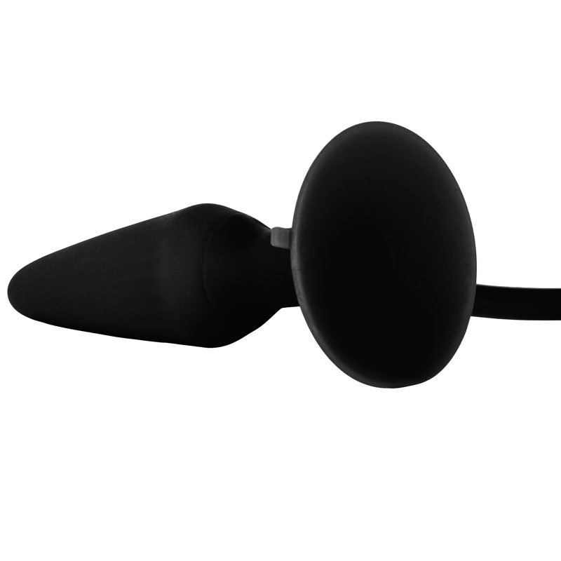 Black rubber butt plug on a white background