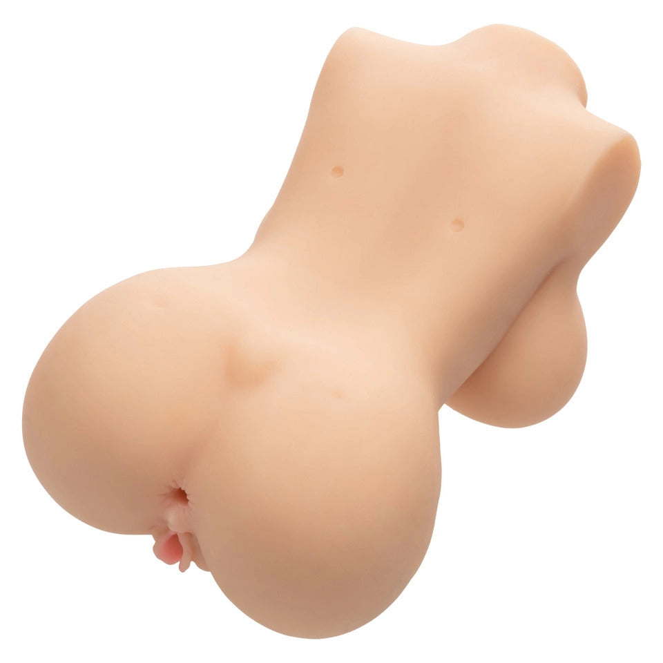 Realistic silicone breast form on a white background