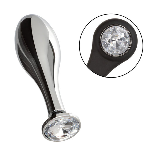 Metallic door handle with crystal detail on a white background