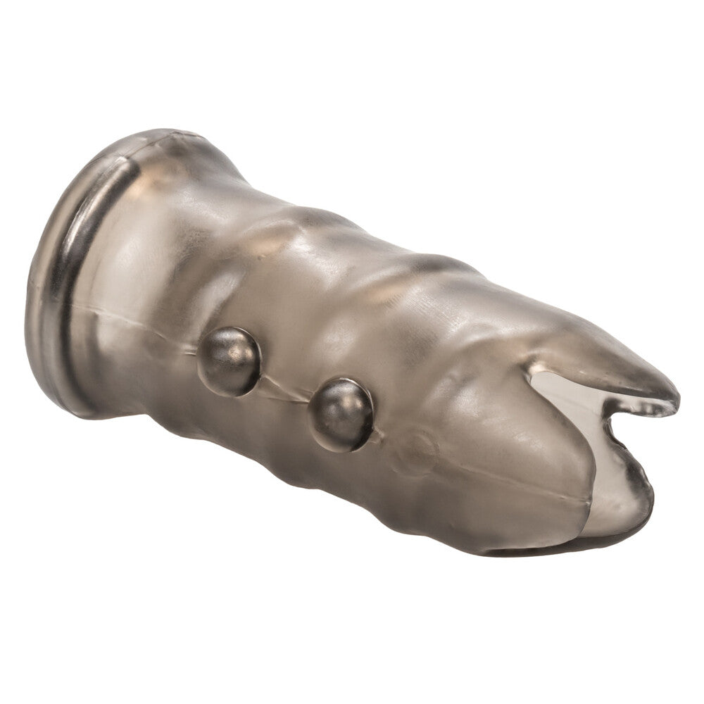 Metallic shark fin ornament on a white background