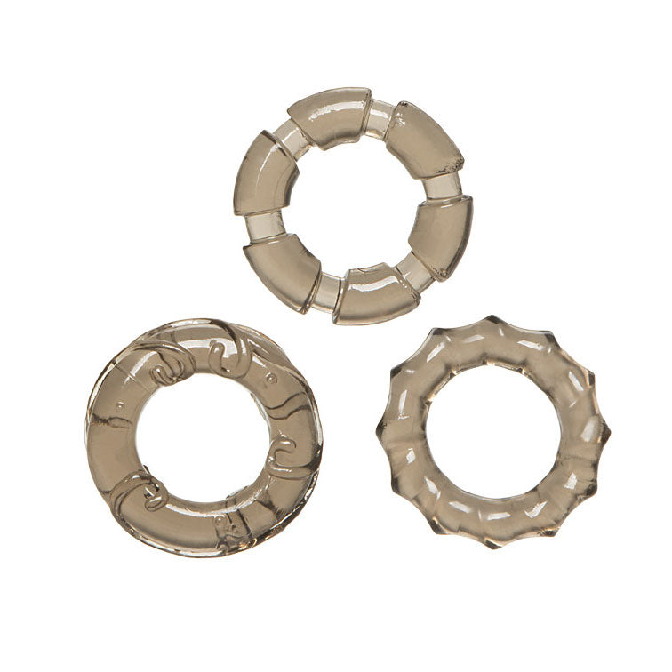 Three beige ceramic rings on a white background