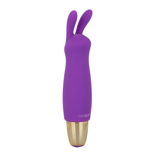 A purple mini rabbit clitoral massager with a silicone head and a gold base. The massager has two flickering ears and an easy-touch control button.