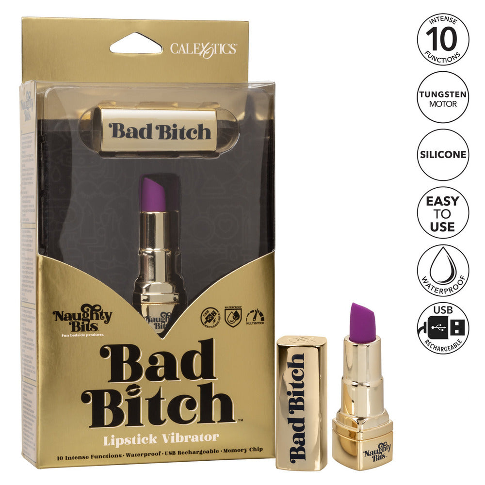 A gold lipstick-shaped vibrator with a deep purple tip, branded 'Bad Bitch' on the shiny casing.