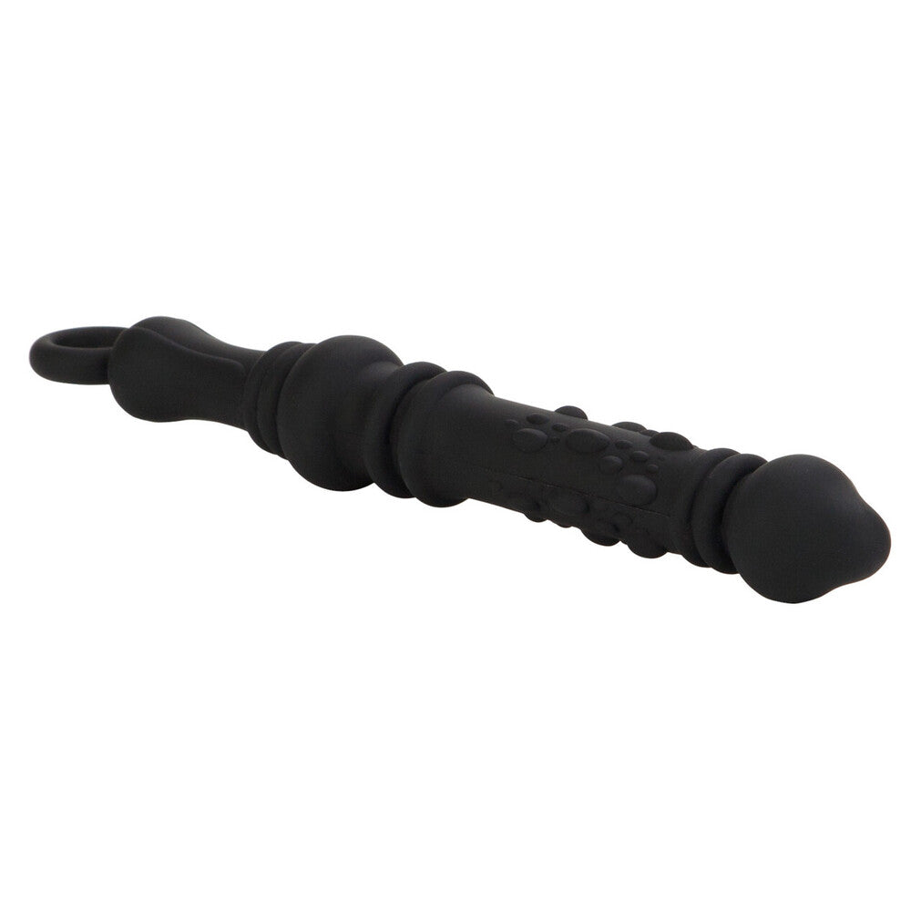 Black massage roller on a white background