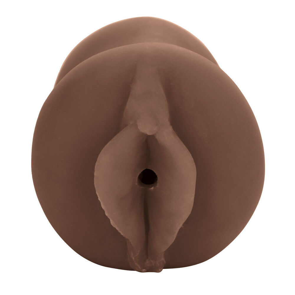 Brown silicone butt plug on a white background
