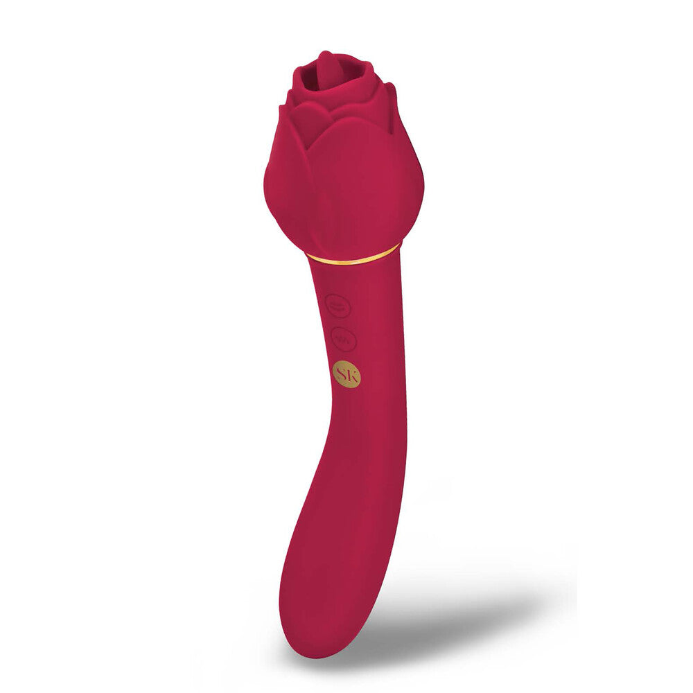 A red dual-ended vibrator being held, with one end insertable and the other featuring a flickering tongue for clitoral stimulation.