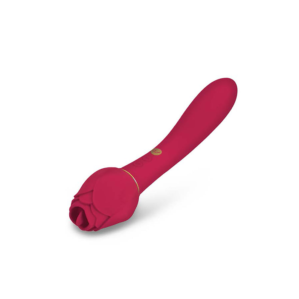 A red dual-ended vibrator being held, with one end insertable and the other featuring a flickering tongue for clitoral stimulation.