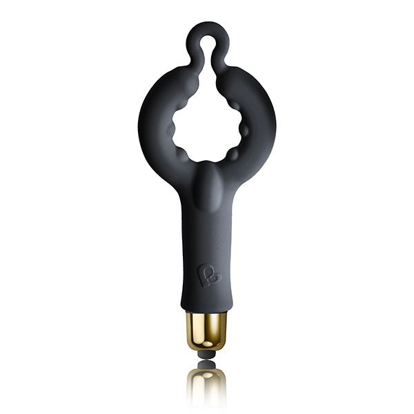 The image shows a black silicone T-shaped base and a golden bullet vibrator, indicating the kit includes these items for couple's pleasure.