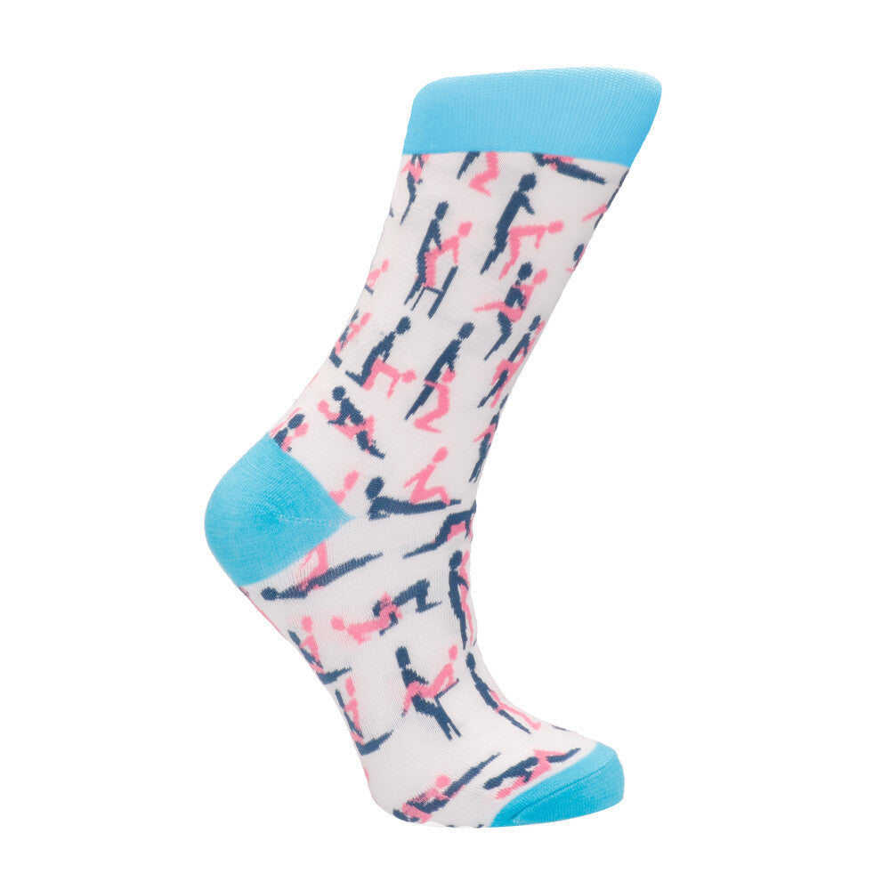 A pair of white socks with a geometric pattern, featuring blue tips and heels.