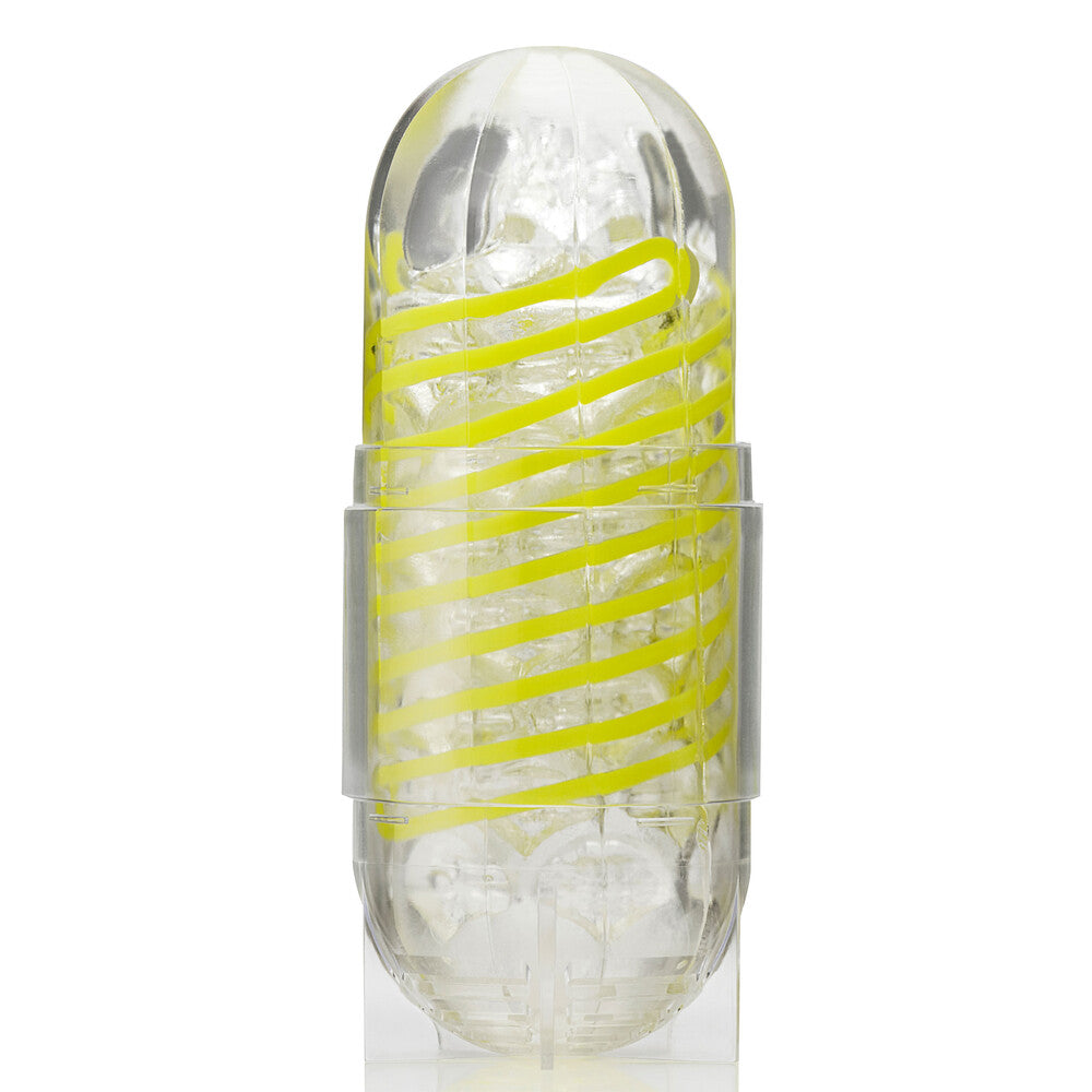 Clear cylindrical container with yellow spiral design on a white background