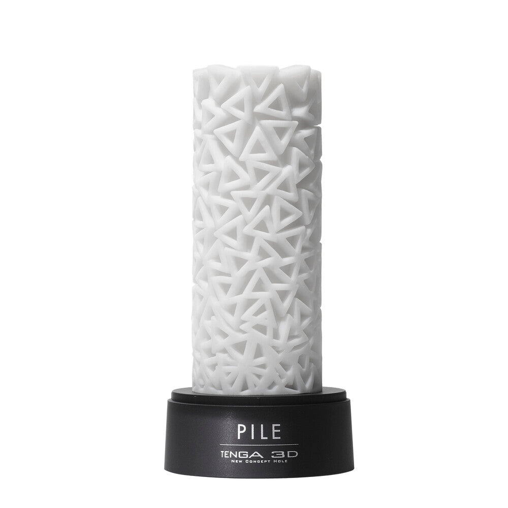 White cylindrical product with geometric pattern on a black base, branded 'Pile' by Tenga 3D.
