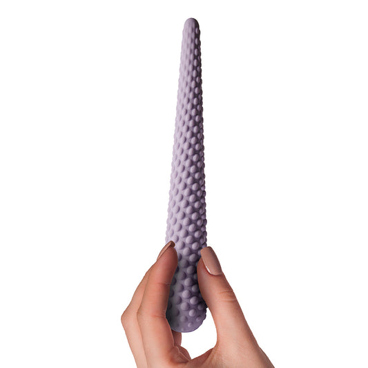 A set of three purple silicone dilators of varying sizes, each with a textured surface.
