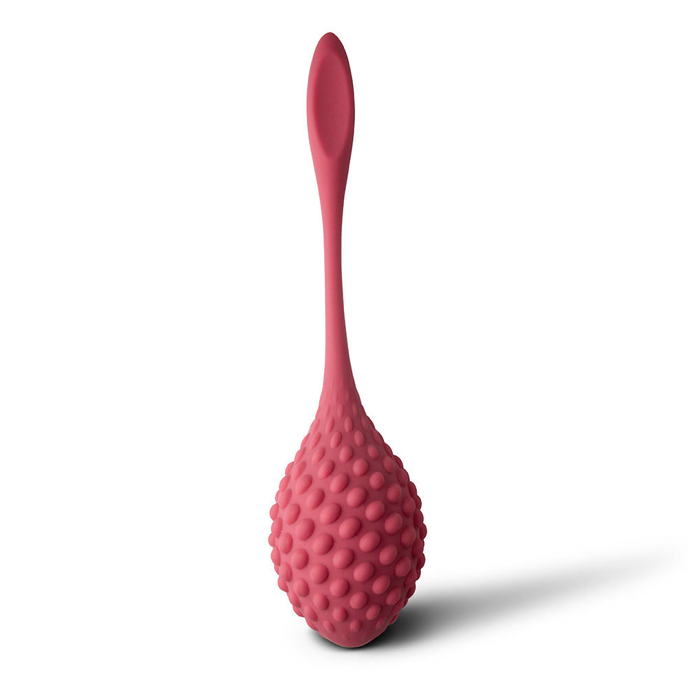 A pair of pink silicone kegels with sensory nodules and retrieval tails, designed for ergonomic insertion and stimulation.