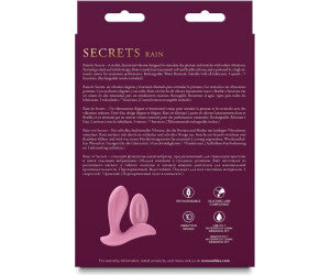 Product packaging with 'Secrets Rain' branding on a purple background