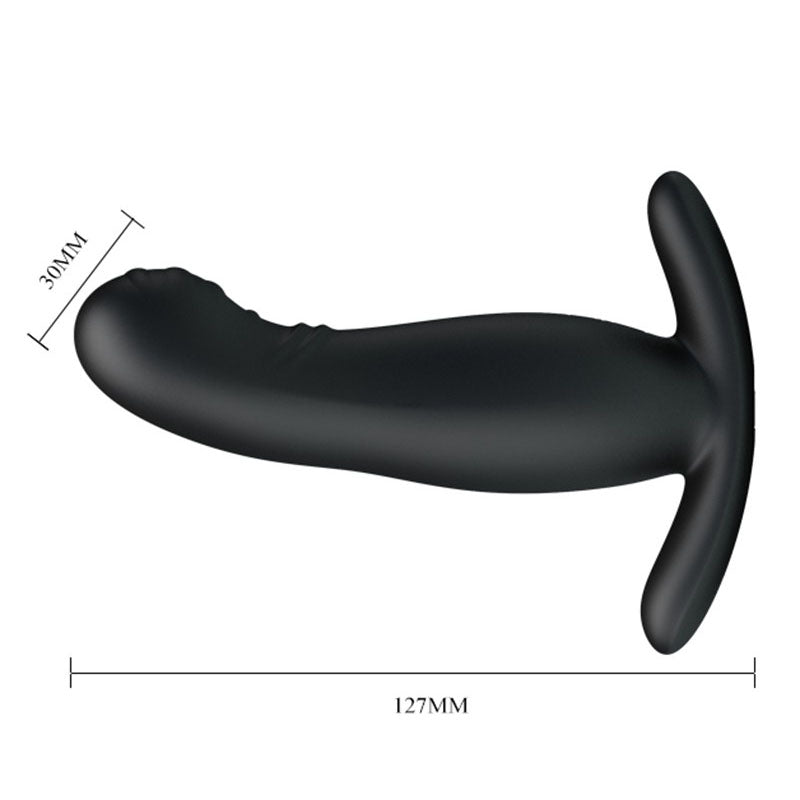 Black curved object with measurements on a white background