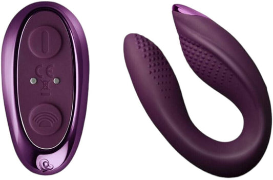 Purple electronic device with a remote control on a white background