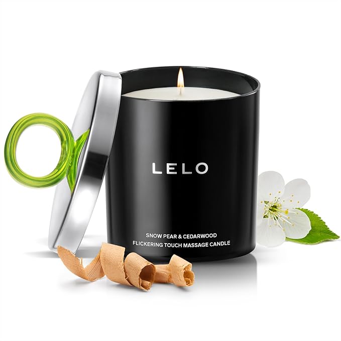 LELO candle with packaging and accessories on a white background