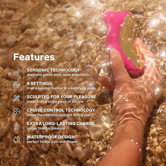 Hand holding a pink and gold device in water with features listed on screen