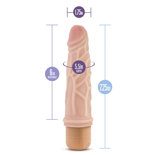 A flesh-colored, realistic vibrator with a twist dial base, featuring veins along its length.