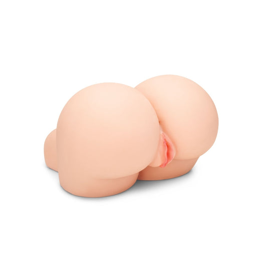 Two silicone breast forms on a white background