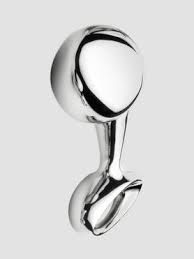 Silver ring with a spherical design on a light gray background