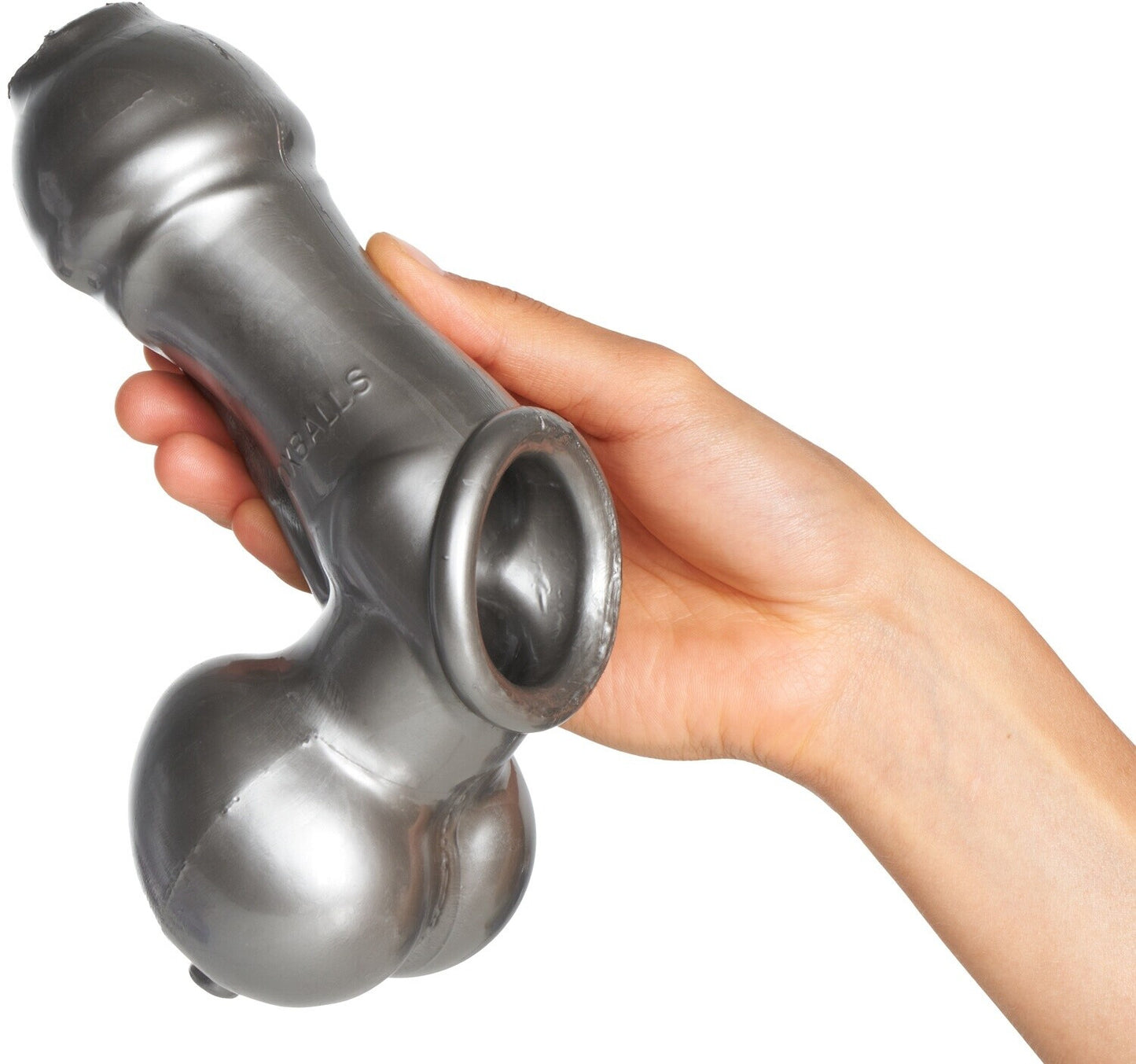 Hand holding a metallic pepper grinder on a white background