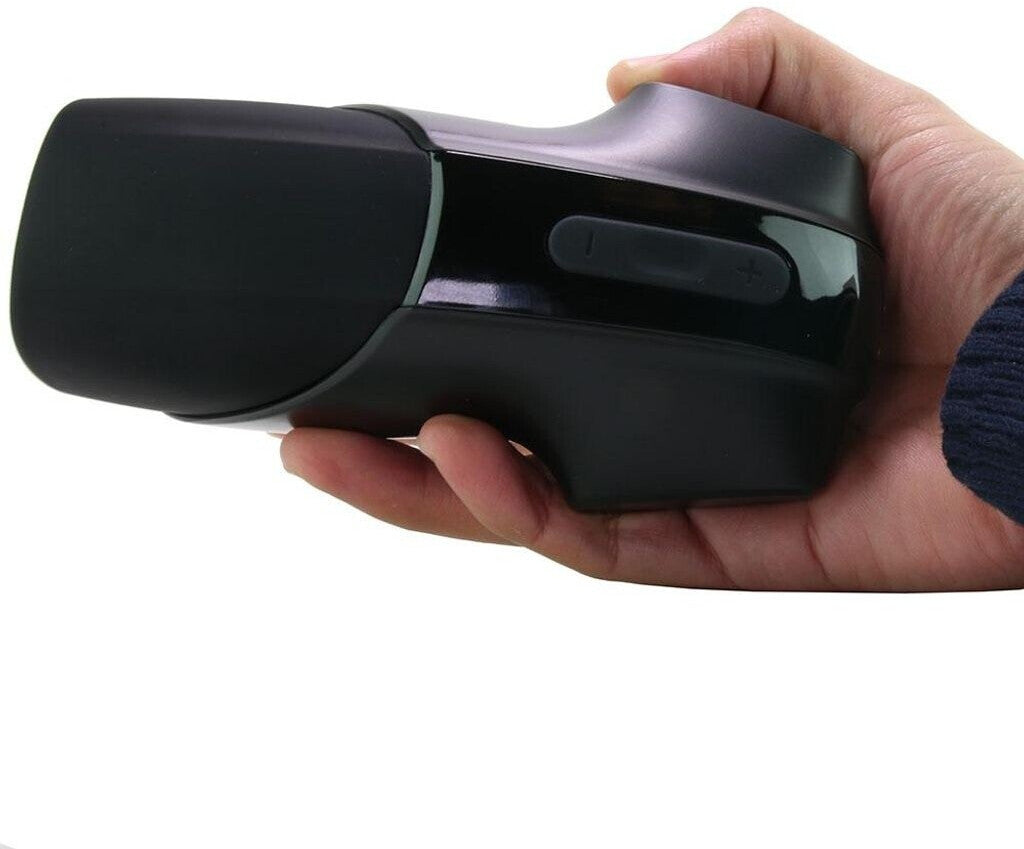 Black electronic device held in a hand against a white background